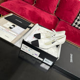 HIGH MARY JANE IN WHITE CALFSKIN AND BLACK SATIN